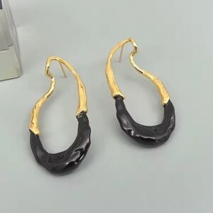 Black enamel and gold drip dangle earrings; nwot